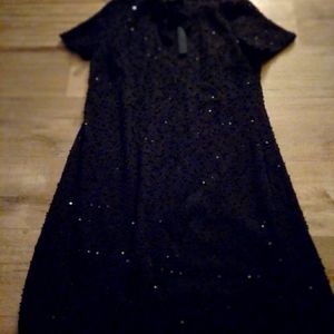 Black, medium knee length dess